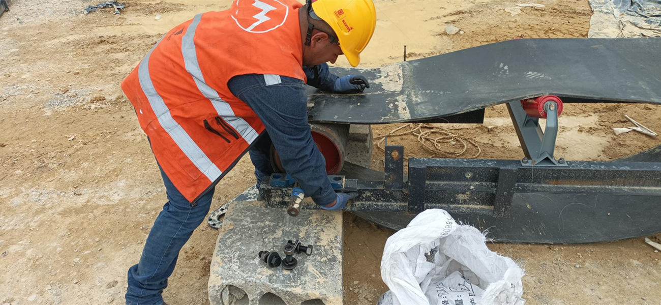 Worker Maintaining Gravel Crusher